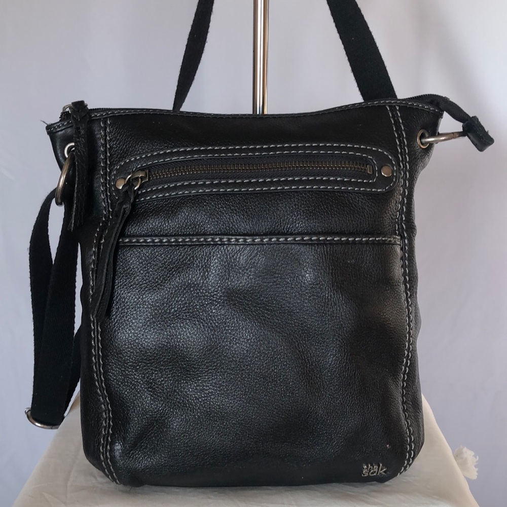 THE SAK black leather handbag.